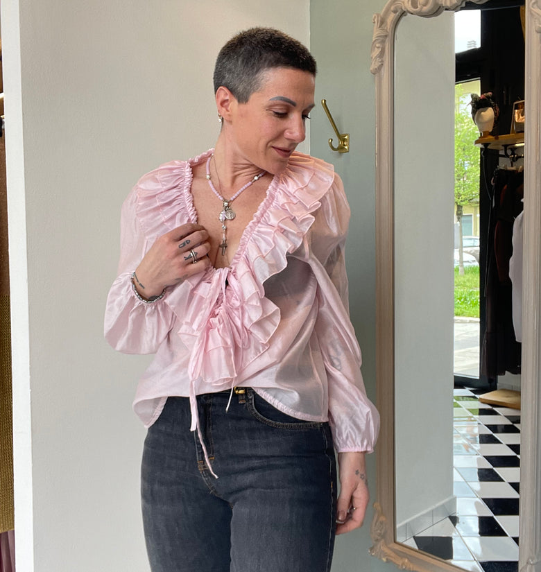 Blusa rosa con frappa