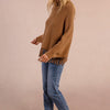 Maglione tipo poncho con frange