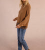 Maglione tipo poncho con frange